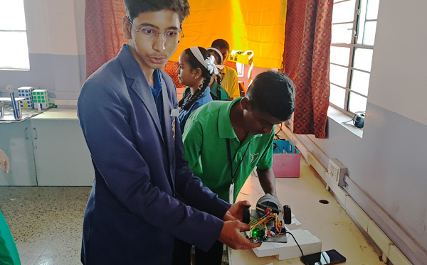 Students presenting science projects at St Joseph High School Ghorpadi